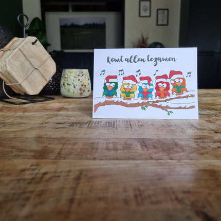 Kerstkaart BySam "komt allen tezamen"