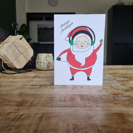 Kerstkaart BySam "Kerstman met headphone"