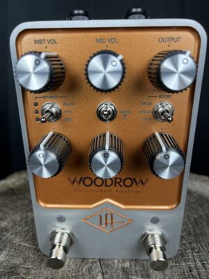 Image of Universal Audio 55 Woodrow Pedal showcasing vintage design and powerful overdrive/distortion tones.