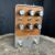Image of Universal Audio 55 Woodrow Pedal showcasing vintage design and powerful overdrive/distortion tones.